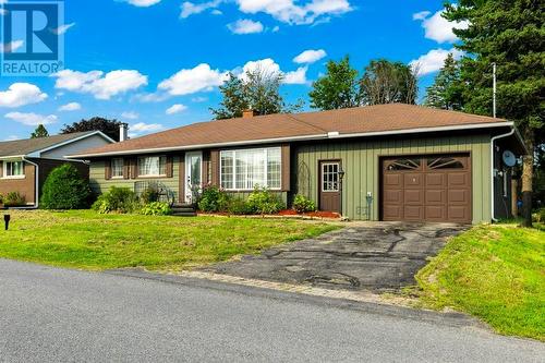 Exterior front showing newer shingles, windows & doors.  Wood siding repainted a few years ago & looks awesome! - 815 Joseph Street E, Cardinal, ON - Outdoor