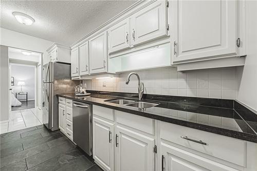 2055 Upper Middle Road|Unit #1408, Burlington, ON - Indoor Photo Showing Kitchen With Double Sink