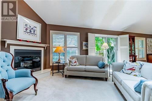 77 Erion Road Unit# 12, St. Catharines, ON - Indoor Photo Showing Living Room With Fireplace