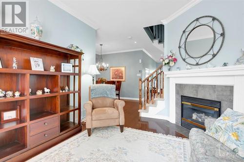 104 Purple Finch Crescent, Ottawa, ON - Indoor Photo Showing Living Room With Fireplace