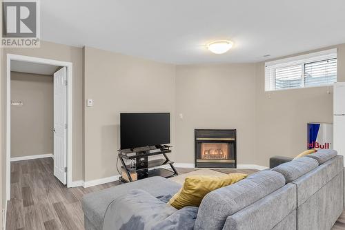 160 Portview Court, Kelowna, BC - Indoor Photo Showing Basement With Fireplace