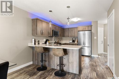 3542 Green Turtle Road, Regina, SK - Indoor Photo Showing Kitchen With Stainless Steel Kitchen With Double Sink With Upgraded Kitchen