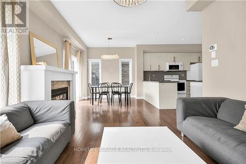 59 - 515 Winston Road, Grimsby, ON - Indoor Photo Showing Living Room With Fireplace