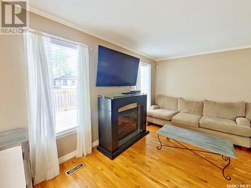 6922 Dalgliesh Drive, Regina, SK - Indoor Photo Showing Living Room With Fireplace