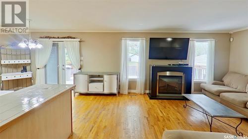 6922 Dalgliesh Drive, Regina, SK - Indoor Photo Showing Living Room With Fireplace