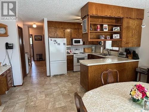 215 Fifth Avenue W, Canora, SK - Indoor Photo Showing Kitchen With Double Sink