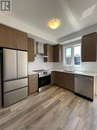 99 - 61 Soho Street, Hamilton (Stoney Creek Mountain), ON - Indoor Photo Showing Kitchen