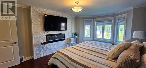 53 Foxborough Trl, Sault Ste. Marie, ON - Indoor Photo Showing Bedroom With Fireplace