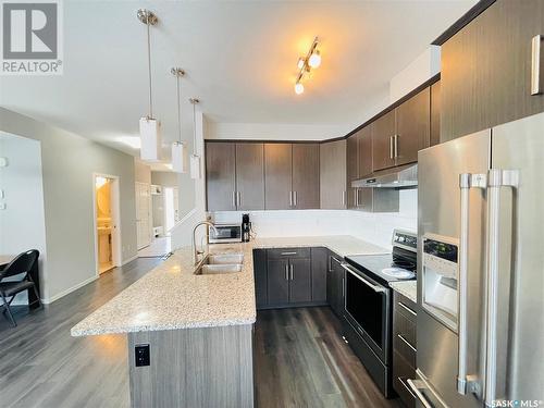 3355 Green Sandcherry Street, Regina, SK - Indoor Photo Showing Kitchen With Stainless Steel Kitchen With Double Sink With Upgraded Kitchen