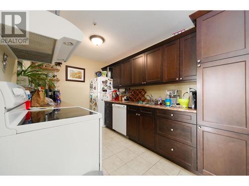 4169-4175 Fraser Street, Vancouver, BC - Indoor Photo Showing Kitchen