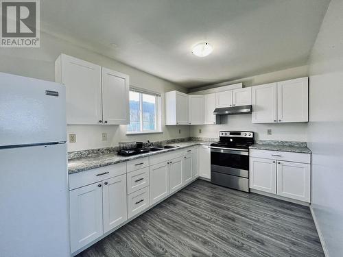 921 W 1St Avenue, Prince Rupert, BC - Indoor Photo Showing Kitchen With Double Sink