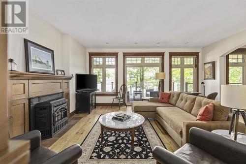 687 Finns Bay Rd N, Echo Bay, ON - Indoor Photo Showing Living Room With Fireplace