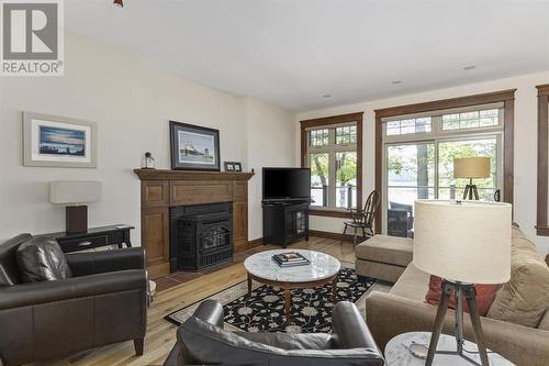 687 Finns Bay Rd N, Echo Bay, ON - Indoor Photo Showing Living Room With Fireplace