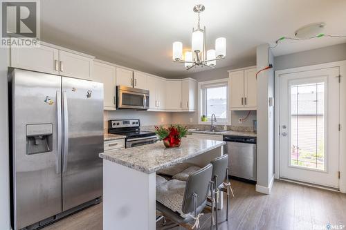 5616 Glide Crescent, Regina, SK - Indoor Photo Showing Kitchen With Stainless Steel Kitchen With Double Sink With Upgraded Kitchen