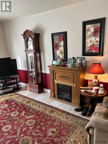 50 Grierson Road, Kirkland Lake, ON - Indoor Photo Showing Living Room With Fireplace