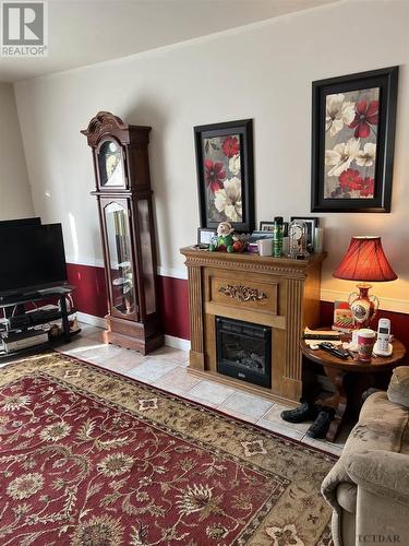 50 Grierson Rd, Kirkland Lake, ON - Indoor Photo Showing Living Room With Fireplace