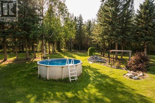 12065 Lower Mud River Road, Prince George, BC - Outdoor With Above Ground Pool With Backyard