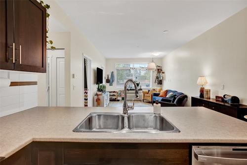 113-1350 Ridgeway Drive, Kelowna, BC - Indoor Photo Showing Kitchen With Double Sink