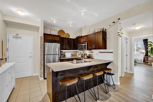 113-1350 Ridgeway Drive, Kelowna, BC - Indoor Photo Showing Kitchen With Double Sink