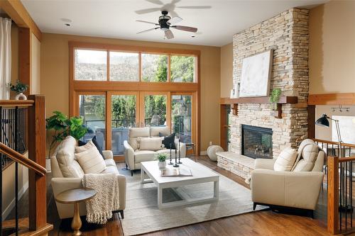 1958 Hidden Lake Place, Kelowna, BC - Indoor Photo Showing Living Room With Fireplace