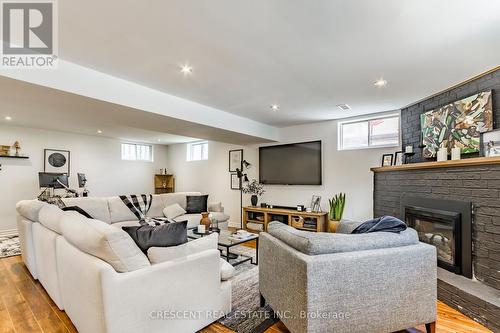 3 Halam Avenue, Hamilton (Burkholme), ON - Indoor Photo Showing Basement With Fireplace