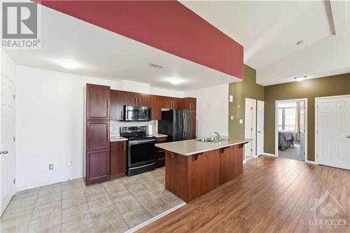 105 Artesa Private Unit#L, Ottawa, ON - Indoor Photo Showing Kitchen With Double Sink