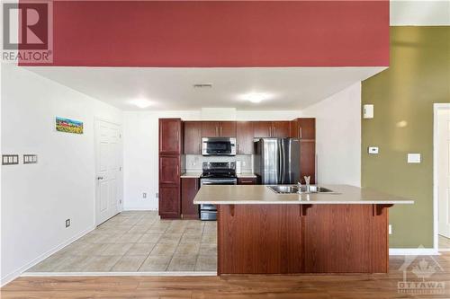 105 Artesa Private Unit#L, Ottawa, ON - Indoor Photo Showing Kitchen With Double Sink