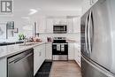 301 - 2605 Binbrook Road, Hamilton (Binbrook), ON  - Indoor Photo Showing Kitchen With Stainless Steel Kitchen With Double Sink With Upgraded Kitchen 