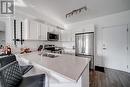 301 - 2605 Binbrook Road, Hamilton (Binbrook), ON  - Indoor Photo Showing Kitchen With Stainless Steel Kitchen With Double Sink With Upgraded Kitchen 