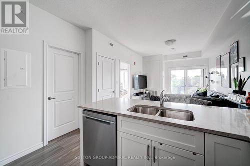 301 - 2605 Binbrook Road, Hamilton (Binbrook), ON - Indoor Photo Showing Kitchen With Double Sink