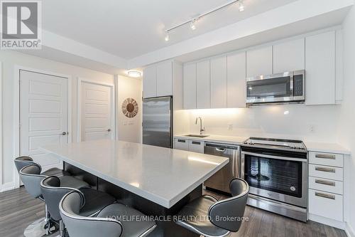 C318 - 301 Sea Ray Avenue, Innisfil, ON - Indoor Photo Showing Kitchen With Upgraded Kitchen