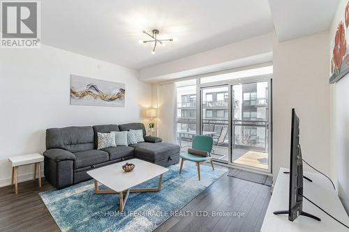 C318 - 301 Sea Ray Avenue, Innisfil, ON - Indoor Photo Showing Living Room