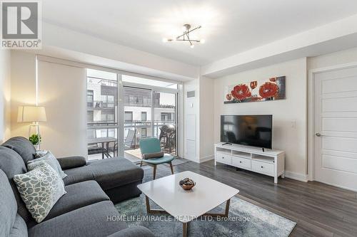 C318 - 301 Sea Ray Avenue, Innisfil, ON - Indoor Photo Showing Living Room