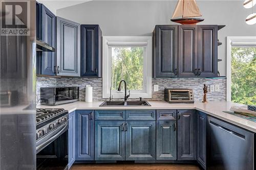 14035 Willbruck Drive, Morrisburg, ON - Indoor Photo Showing Kitchen With Double Sink