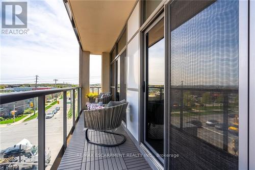 404 - 1940 Ironstone Drive, Burlington (Uptown), ON - Outdoor With Balcony With Exterior