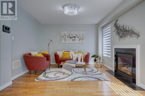 15 Thackery Drive, Ajax (Northeast Ajax), ON - Indoor Photo Showing Living Room With Fireplace