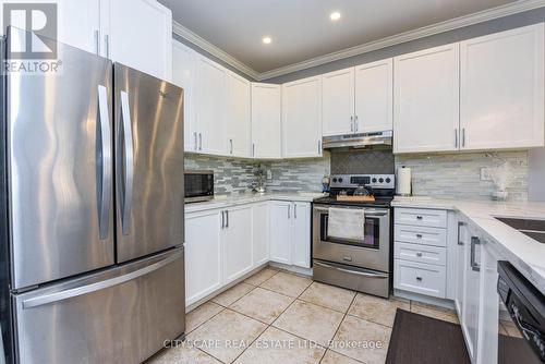 409 Spring Blossom Crescent, Oakville (Iroquois Ridge North), ON - Indoor Photo Showing Kitchen With Upgraded Kitchen