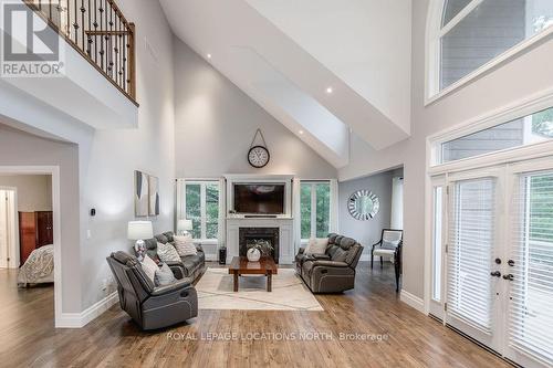 119 Wendake Road, Tiny, ON - Indoor Photo Showing Living Room With Fireplace