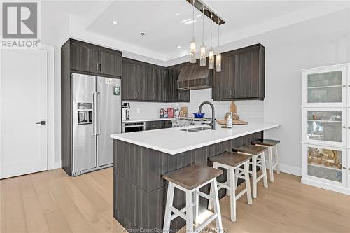 14400 Tecumseh Road East Unit# 213, Tecumseh, ON - Indoor Photo Showing Kitchen With Double Sink With Upgraded Kitchen