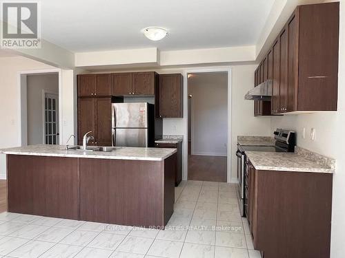 31 Gold Park Gate, Essa, ON - Indoor Photo Showing Kitchen With Double Sink