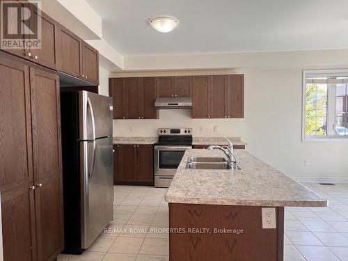 31 Gold Park Gate, Essa, ON - Indoor Photo Showing Kitchen With Double Sink