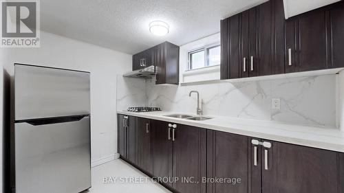 Lower - 57 Millerdale Road, Richmond Hill (Crosby), ON - Indoor Photo Showing Kitchen With Double Sink