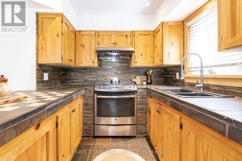 774 Lafontaine Road W, Tiny, ON - Indoor Photo Showing Kitchen With Double Sink