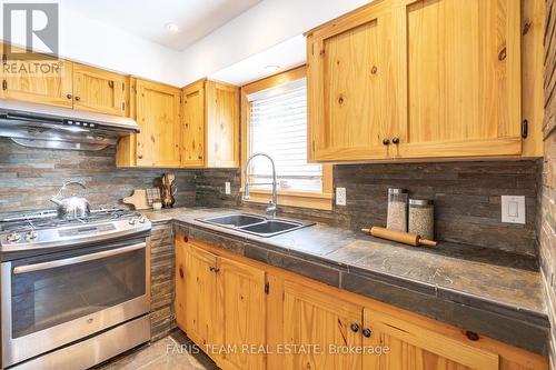 774 Lafontaine Road W, Tiny, ON - Indoor Photo Showing Kitchen With Double Sink