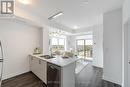 613 - 470 Dundas Street E, Hamilton (Waterdown), ON  - Indoor Photo Showing Kitchen With Double Sink 