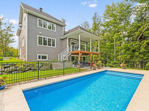 Back facade - 4 Rue De La Rivière, Lac-Brome, QC - Outdoor With In Ground Pool With Backyard