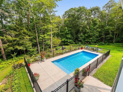 Pool - 4 Rue De La Rivière, Lac-Brome, QC - Outdoor With In Ground Pool With Backyard