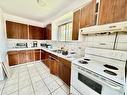 Kitchen - 4593 Ch. Bélair, Laval (Chomedey), QC  - Indoor Photo Showing Kitchen With Double Sink 