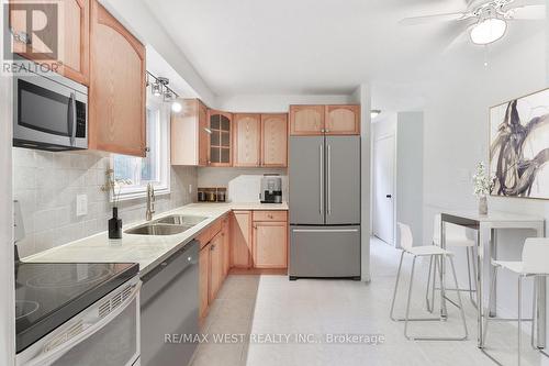 83 The Boulevard, New Tecumseth, ON - Indoor Photo Showing Kitchen With Double Sink