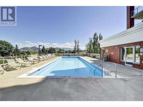 1160 Bernard Avenue Unit# 310, Kelowna, BC - Outdoor With In Ground Pool